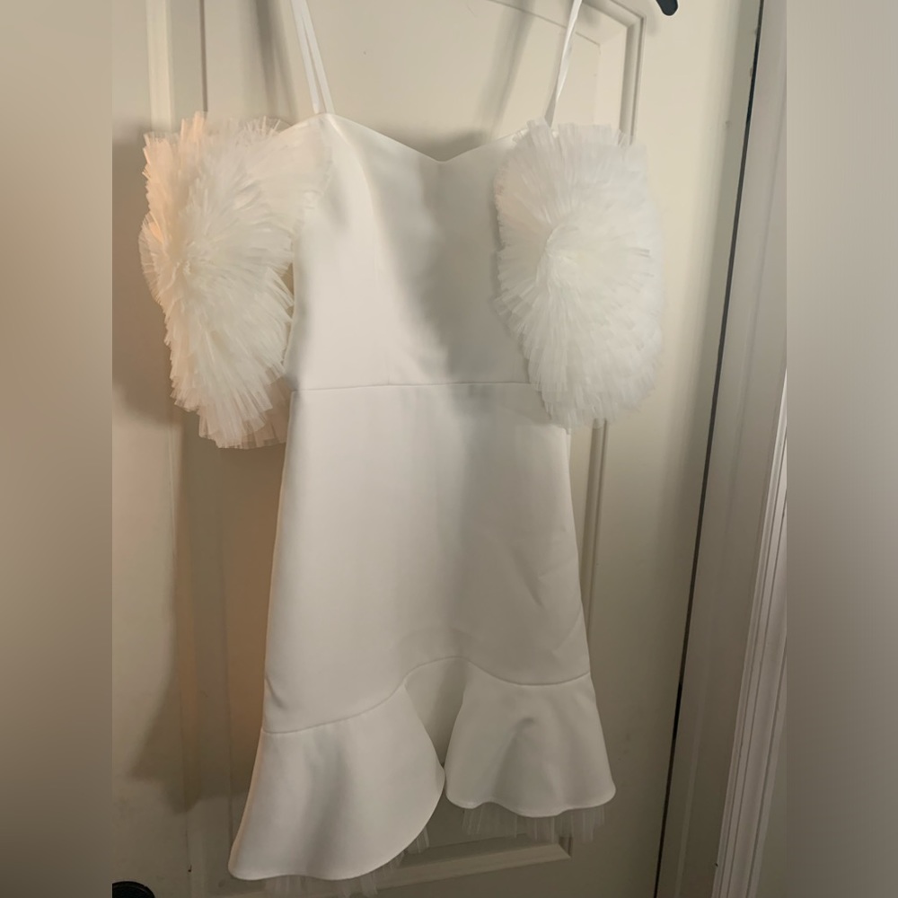 White, off shoulder BCBG dress.